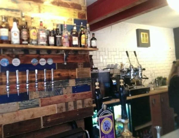 An image of a coffee machine in a pub.