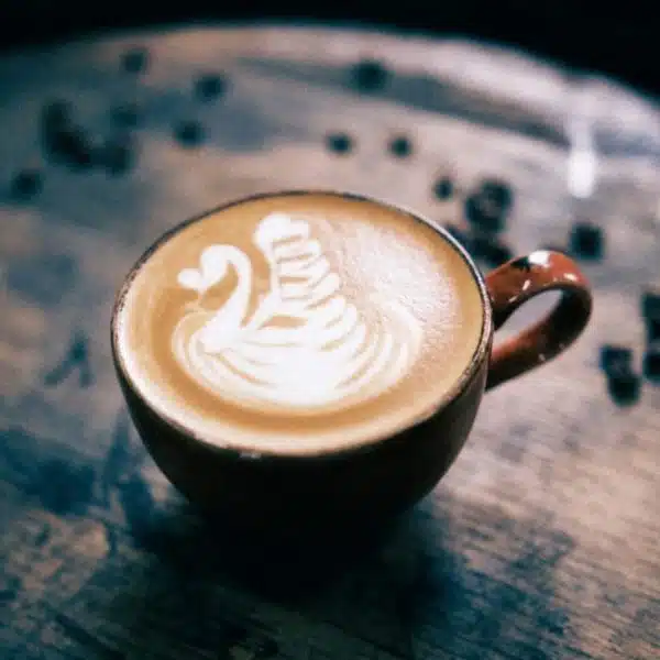A cup of coffee with Latte swan art
