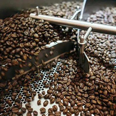 Image of coffee beans on a table.